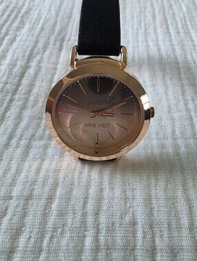 Nine West Rose Gold Tone Watch With Black Strap